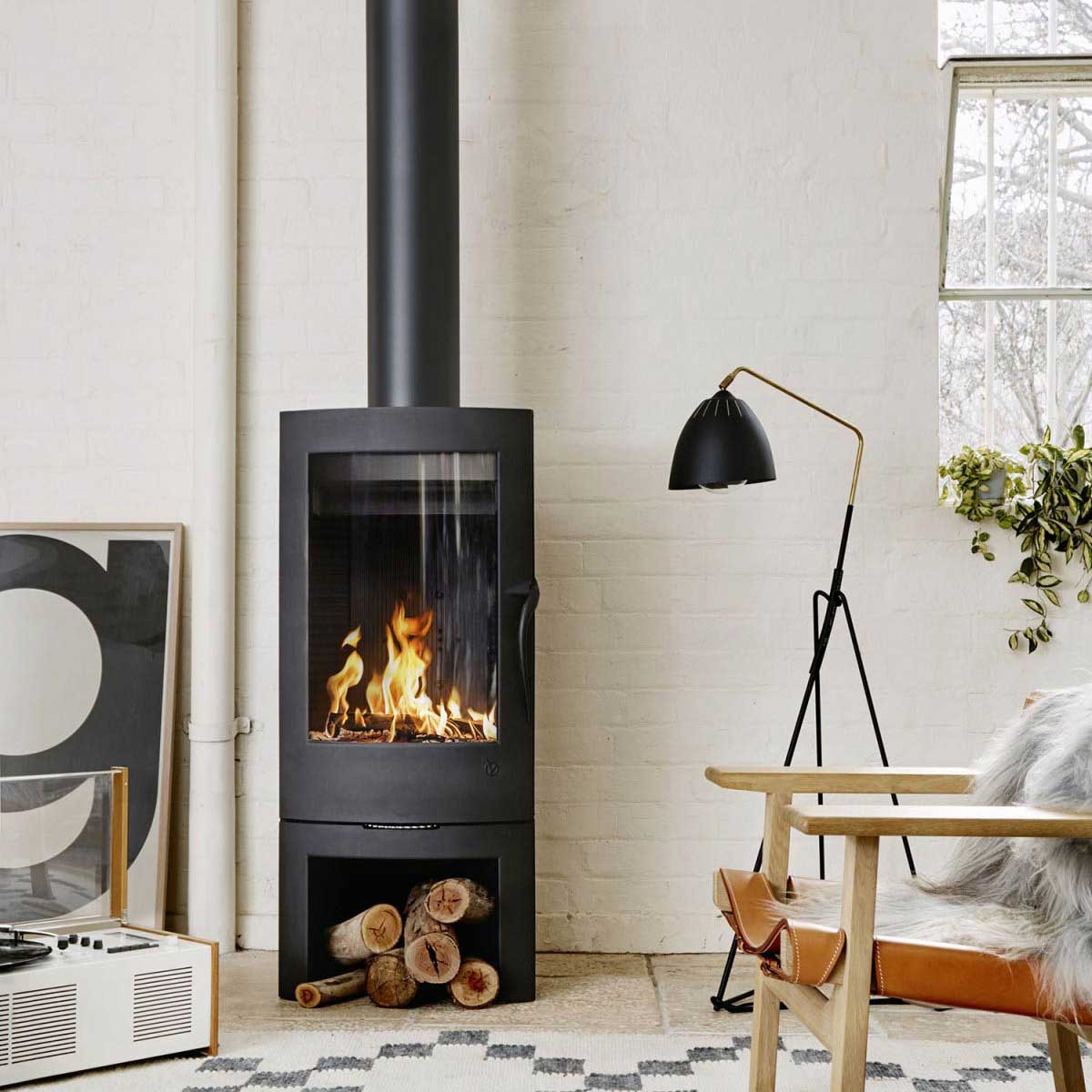 Invicta Argos wood heater in stylish living room
