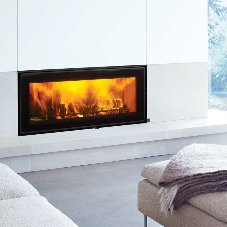 Regency Montrose inset wood heater in white stone fireplace