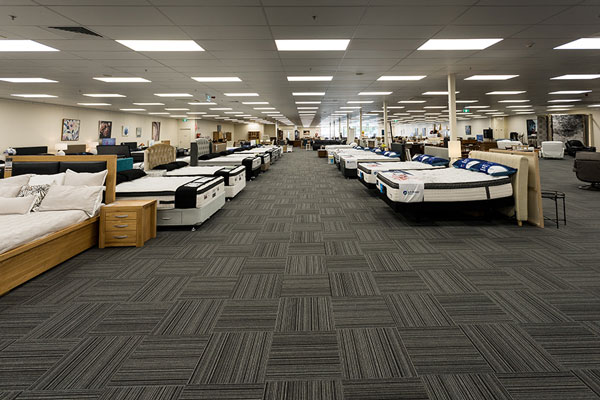 Wolhers Richmond large bed and mattress showroom floor.