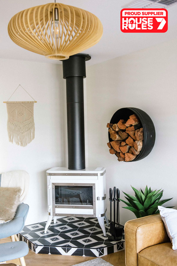 Image of stylish white wood fire with text Proud Supplier of House Rules Channel 7